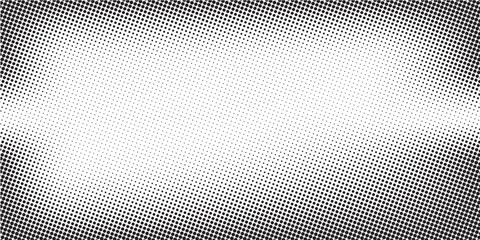 Fototapeta premium Halftone faded gradient texture. Grunge halftone grit background. White and black sand noise wallpaper.