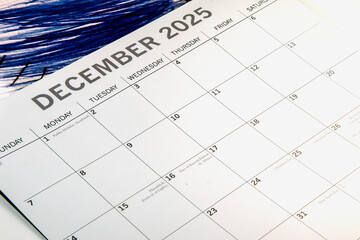 December 2025 calendar taken from a side angled view