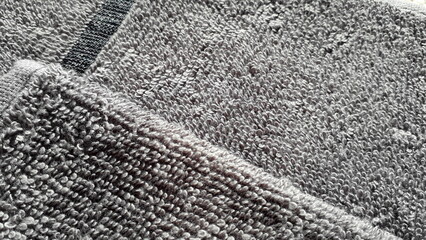 Interior fabric. Gray terry towel cotton fabric. Towels. Texture of cotton fabric. Textile gray background.