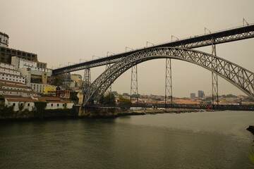 Fototapeta premium The Ponte Maria Pia was the largest arched bridge in the world when it opened in 1877. Along with the Garabit Viaduct, it is Gustave Eiffel's most famous bridge. Douro river, Porto Portugal.