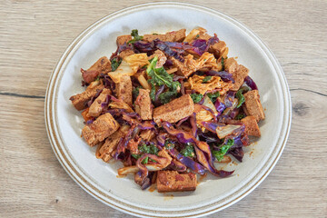 Delicious Stir-Fried Tofu with Colorful Vegetables on a Plate