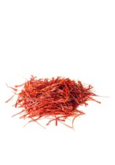 Naklejka premium Closeup of Organic Saffron or Kesar Heap Isolated on White Background with Copy Space in Vertical Orientation