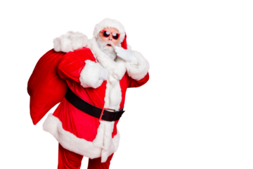 Photo of traditionally dressed amazed father hipster making noise while coming sneaking into house home at midnight noel holding hand near face large sack on back isolated vivid background copyspace