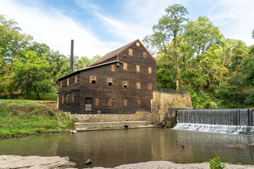 Pine Creek Grist Mill, built in 1848, on a sunny summer morning at Wildcat Den State Park.  Muscatine, Iowa, USA. © Nicola