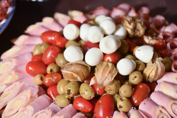 breakfast table with fruit bread cheese snack tropical salad ham grapes chestnut healthy food