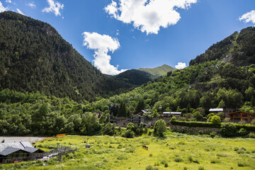 Cable car in green mountains in summer, funicular in Ordino, Andorra