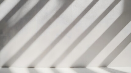 Obraz premium Blurred overlay effect for photo and mockups. Wall texture with organic drop diagonal shadow and rays of light on a white wall. shadows for natural light effects