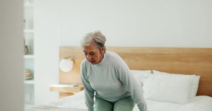 Getting up, standing and senior woman in bedroom of retirement home for mobility exercise. Balance, recovery and rehabilitation with senior person on bed in apartment for morning health routine