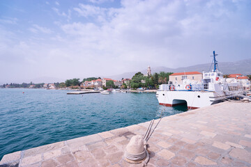 Boats moored on Kastel coast in Dalmatia,Croatia. Old town near Adriatic sea.