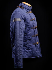 Historical fashion. Medieval knight cloth. Padded jacket gambeson.