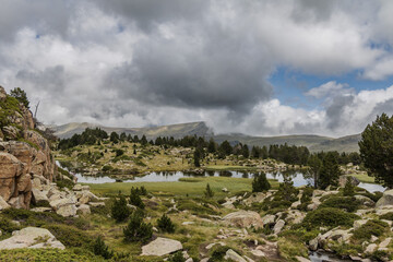 Estany del Cap dels Pessons, lake de Pessons in the Pyrenees mountains of Andorra, summertime