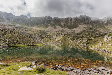 Estany del Cap dels Pessons, lake de Pessons in the Pyrenees mountains of Andorra, summertime