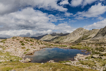 Estany del Cap dels Pessons, lake de Pessons in the Pyrenees mountains of Andorra, summertime