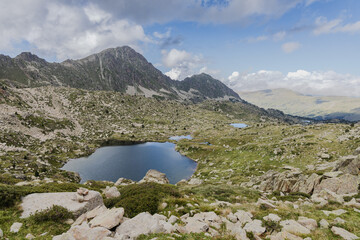 Estany del Cap dels Pessons, lake de Pessons in the Pyrenees mountains of Andorra, summertime
