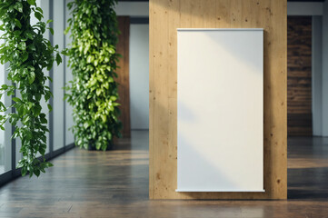 Pull up banner mockup stands in a stylish building hallway. Blank roll-up display for promotional or marketing content in a sustainable interior.