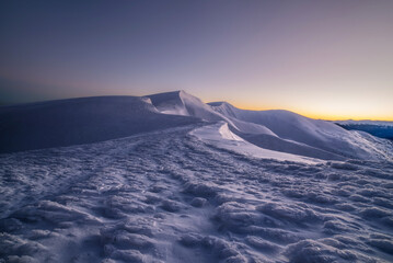 magical sunrise on a mountain peak. snowy Mountain peaks. fairytale calming landscape