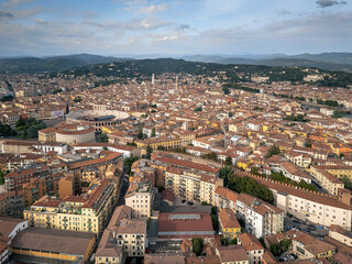 Fototapeta premium Italy, September 22, 2024: Panoramic aerial view of the city of Verona in Veneto. Also called the city of love with its arena and the Adige river