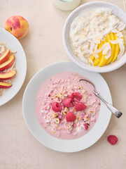 Overnight oats with various toppings. Fitness healthy organic breakfast in a bowl