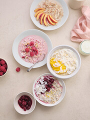 Overnight oats with various toppings. Fitness healthy organic breakfast in a bowl