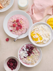Overnight oats with various toppings. Fitness healthy organic breakfast in a bowl
