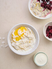 Overnight oats with various toppings. Fitness healthy organic breakfast in a bowl