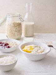 Overnight oats with mango and coconut topping. Fitness healthy breakfast in a bowl