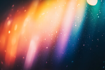 Blur colorful warm rainbow light leaks on black background with dust texture. Defocused abstract damaged scratched retro film analog effect for using over photos as overlay or screen filter