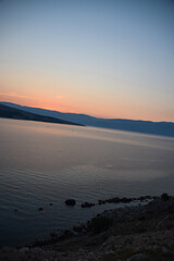 sunrise over the sea, clear sky without clouds. golden hour.	
