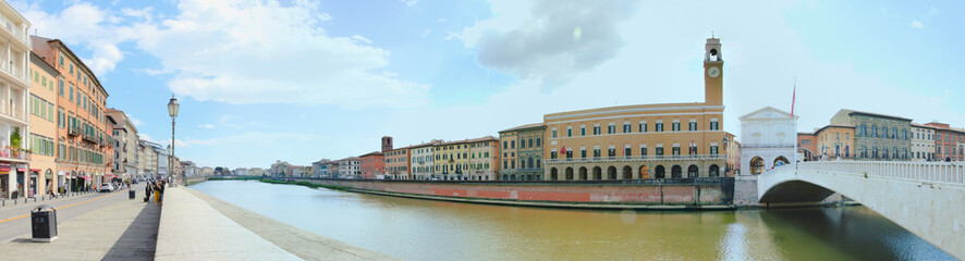 Naklejka premium Lungarno Galilei, the neighborhood along the bank of the Arno River in Pisa, Tuscany, Italy