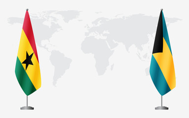 Ghana and Bahamas flags for official meeting against background of world map.