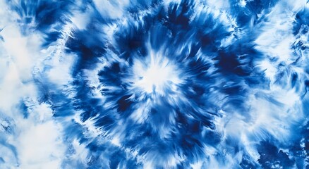 Abstract tie-dye pattern in indigo blue and white, creating an artistic backdrop for design projects. The shibori technique adds depth to the artwork with its unique blending of colors and textures.