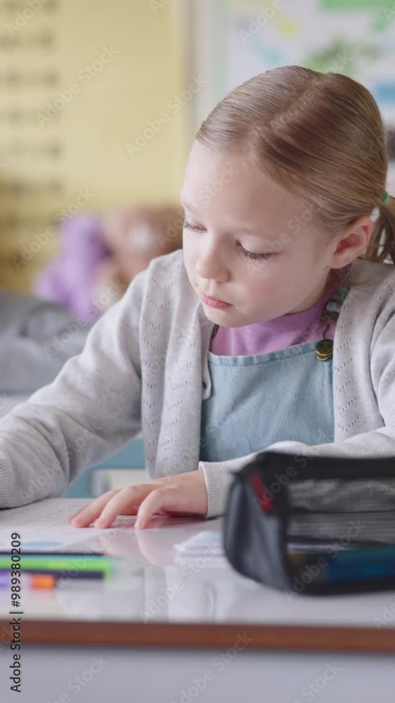 Aufkleber Girl, writing and test in classroom for education, thinking or problem solving for maths quiz at academy. Child, exam and assessment with solution, learning and development with progress at school