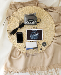 Vintage audio player and mobile phone. Mockup for pregnancy announcement. Gadgets for The 90-00's ....