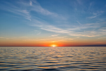 Obraz premium Summer sunset on Lake Peipus. Pskov region