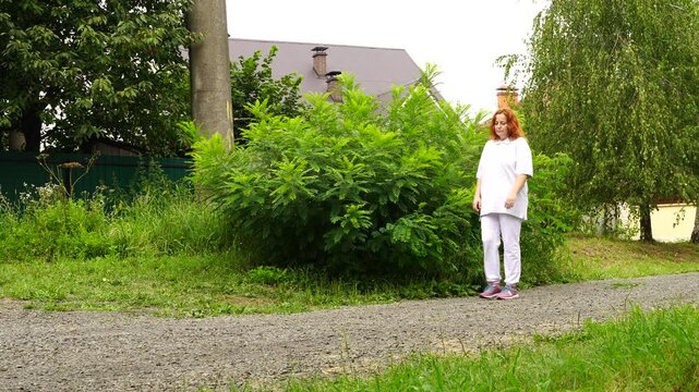 Senior woman walks relaxing outdoor on nature