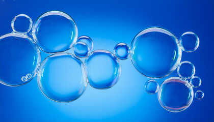 Shimmering soap bubbles on vibrant blue background. Glowing shades and fluid patterns. Close-up.
