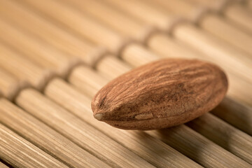 a healthy almond on a wooden background with soft lighting