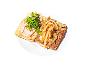 Banh mi thit, Vietnamese cuisine. Bread are wet with cheese, pate. Topped with ham, cold cuts, shredded pork, cucumber slices, cilantros, red pepper, pickles.Soy sauce or salt, pepper enriches flavour