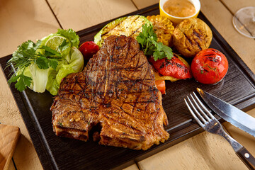 Juicy T-Bone Steak with Grilled Vegetables A Vibrant, Delicious Culinary Masterpiece