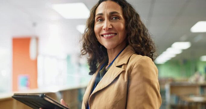 Mature woman, smile and tablet in library for education, knowledge and career in school. Child therapist, happy and portrait in book room for outsource consultation, student information and academics