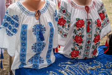 Old traditional Romanian folk costumes with embroidery, specific for womens