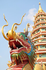 Colorful Thai Dragon, Phaya Naga Statue in front of the Phop Chok Dhamma Chedi, part of the Wat Huay Pla Kang Temple Complex, Chiang Rai, Thailand