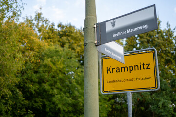 Sign showing the way on the Berlin Wall trail and the sign Krampnitz