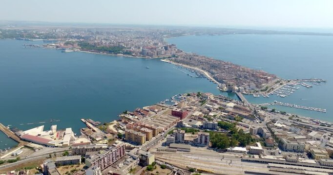Aerial panoramic view of Taranto, one of the most important cities in Puglia, Italy. The Gulf of Taranto overlooks the Ionian Sea.