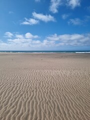 Tranquil Sandy Beach in Mar del Plata on a Clear Day