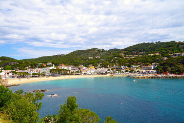 Fototapeta premium view to beautiful bay with beach and promenade of the village Llafranc seen from the Camí de Ronda, Costa Brava, Girona, Catalonia, Spain