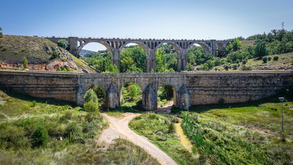 The Charles IV Bridge is a baroque monument in the city of Soria (Spain). It was built to span the...