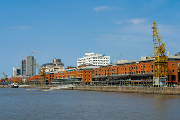 Fototapeta premium View of the docks with the old buildings recycled and transformed into offices and apartments.