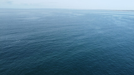 Obraz premium Calm Ocean Under Clear Sky