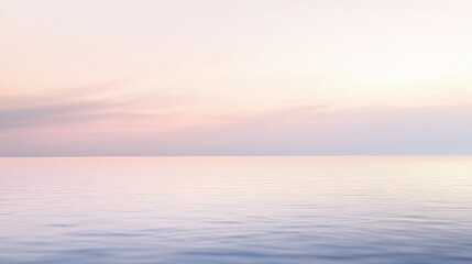 Calm sunset over the serene ocean, showcasing soft pastel colors reflecting on the tranquil water surface during twilight